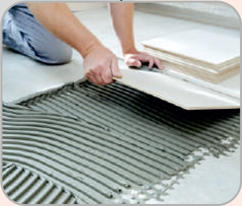 Floor tile adhesive application