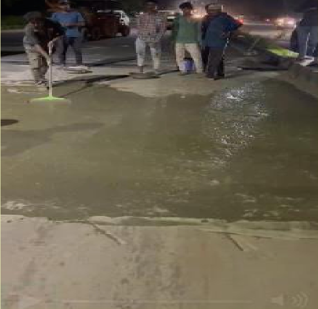 Cementitious grout application on road surface